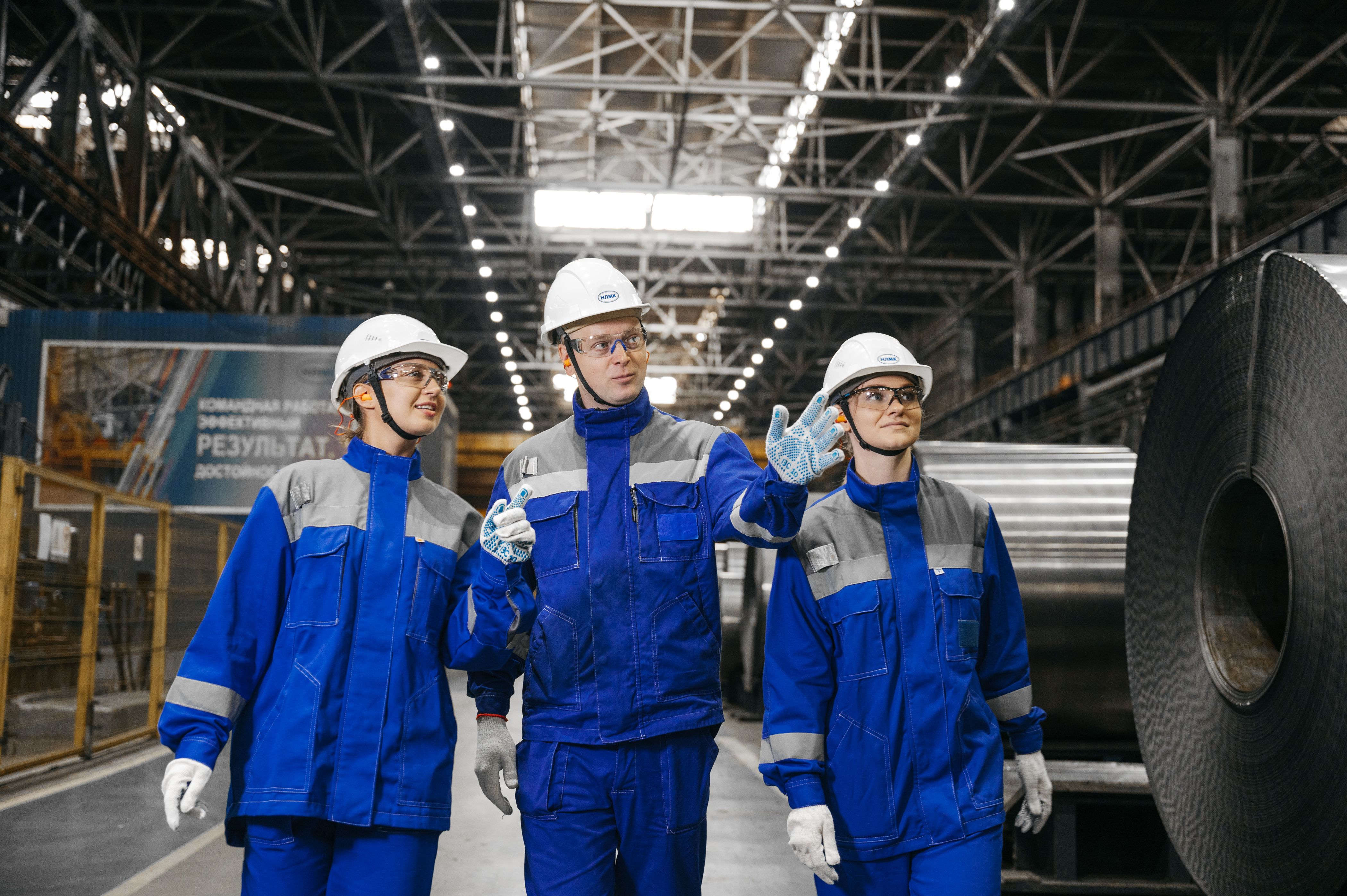 Engineers working in fabrication facility